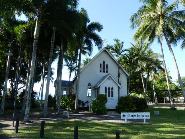 Small church in a park by the water