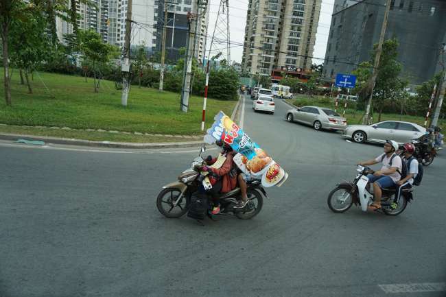 A small family on a motorcycle