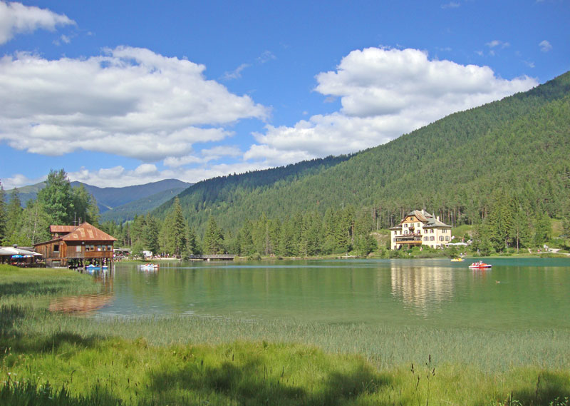 View of Lake Toblach, the hotel, and the boat rental