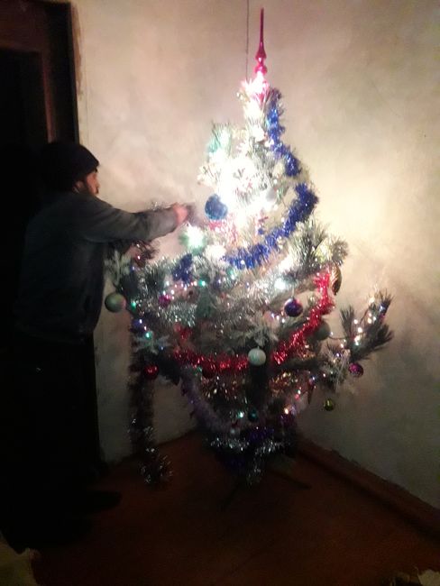 Harut decorates the little tree