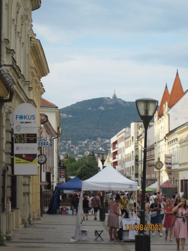 Pedestrian zone of Nitra with a view of Mount Zabor