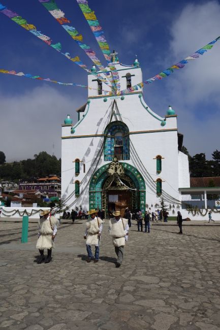 The Tzotzil church with men in their traditional clothing