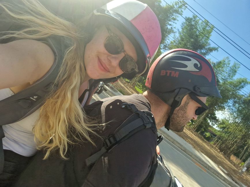 Riding a scooter with luggage