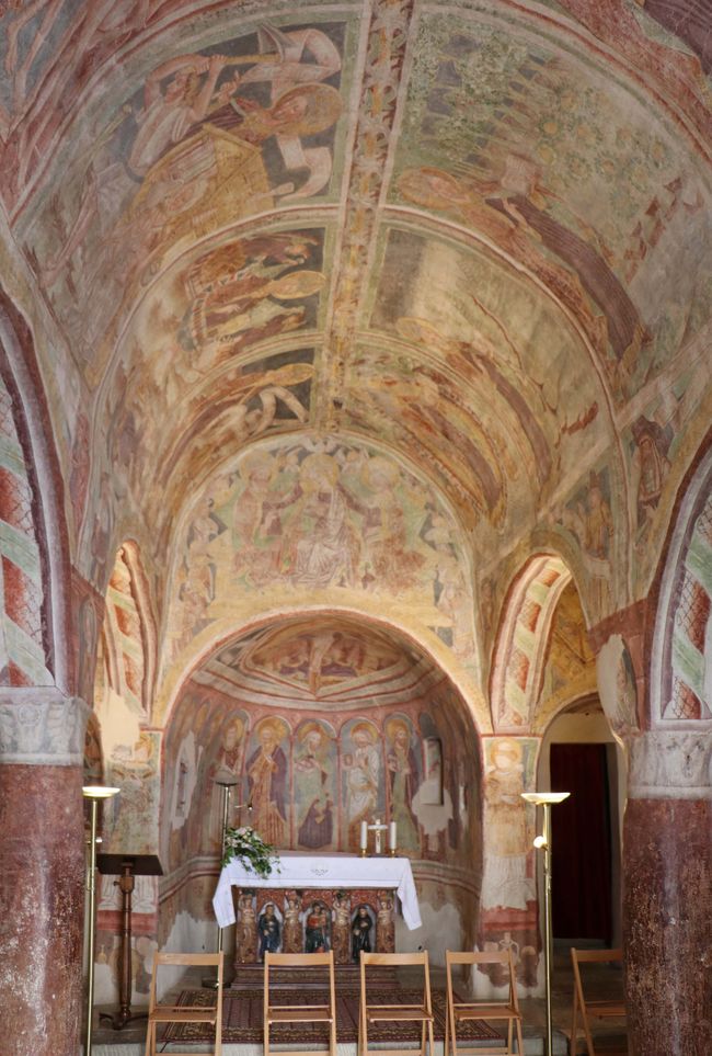 The medieval frescoes inside the church...