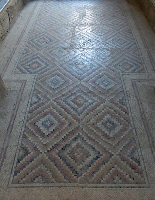 Well-preserved mosaic floor in a smaller bath