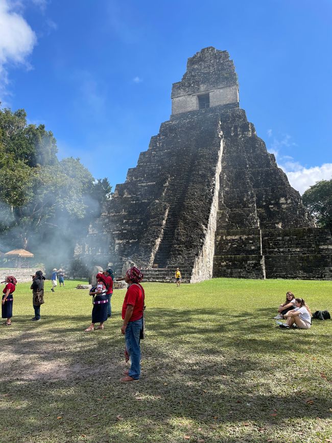 Fire ceremony in front of the Great Jaguar Temple