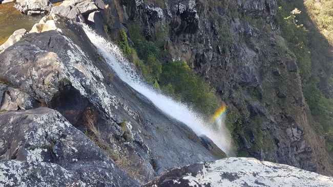 To this waterfall with a rainbow.