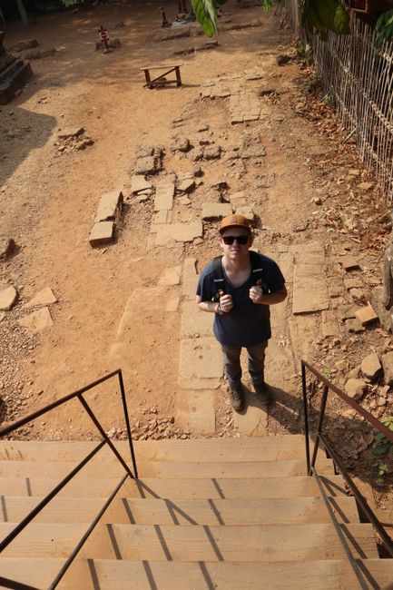 Martin at the foot of a staircase at Bakheng.