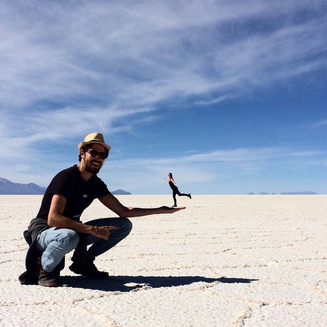 Salt desert, flamingos and volcanoes