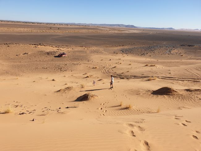 On the windward side of mountains, huge sand dunes form