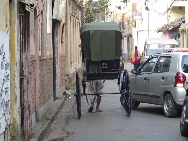 Rickshaw gegen Auto
