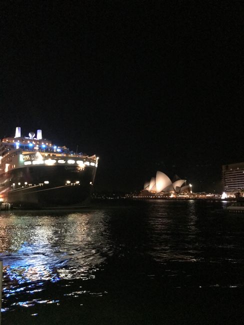 Circular Quay at Night with the Queen Mary 2 in the Harbor