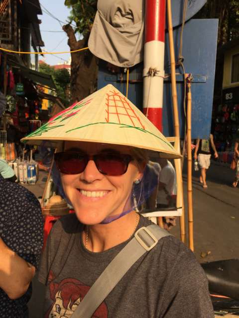 Wide grin with bamboo hat