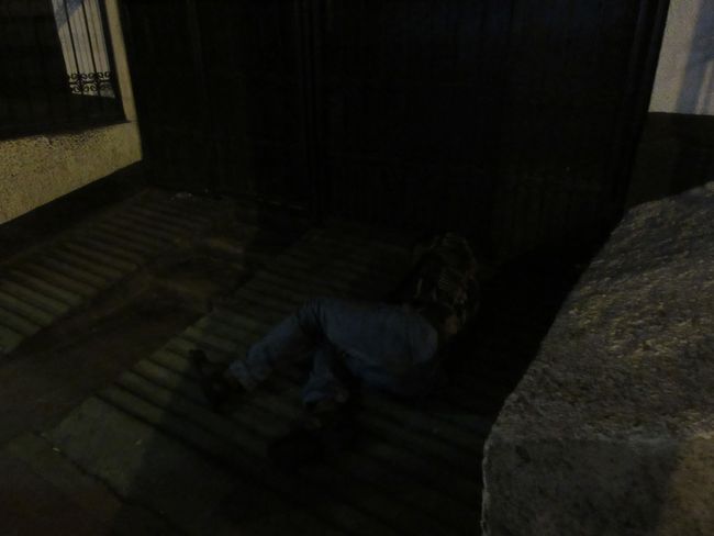Homeless person in front of the town hall