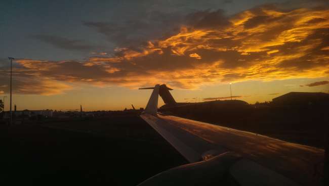 Beautifully colored sky as we boarded the plane