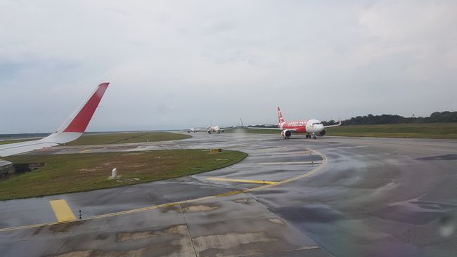 Our Air Asia flight took off with a delay. The airspace was too crowded, so the waiting planes were stuck on the ground. 