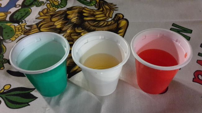From left to right: lime, tequila, strawberry