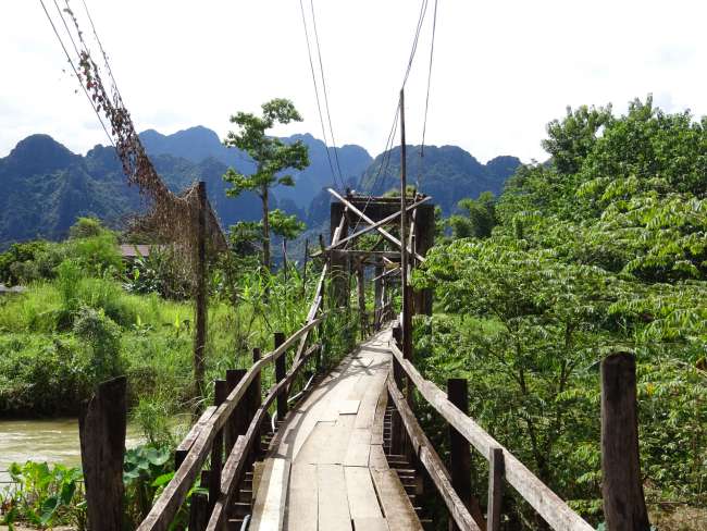 Start in Laos in the now idyllic oasis of Vang Vieng