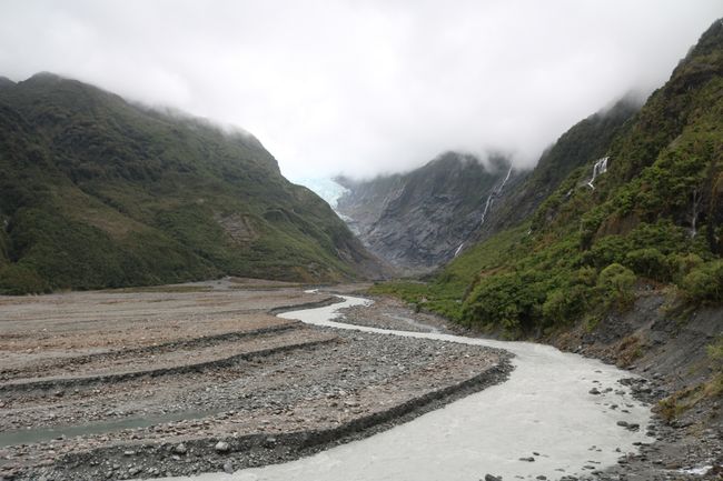 The riverbed filled with icy glacier water
