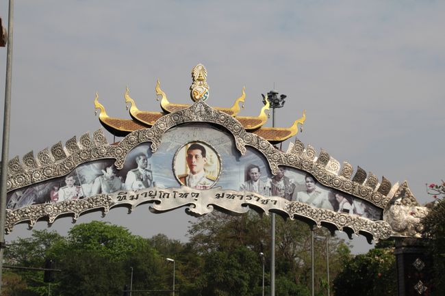 Arch over street with picture of king