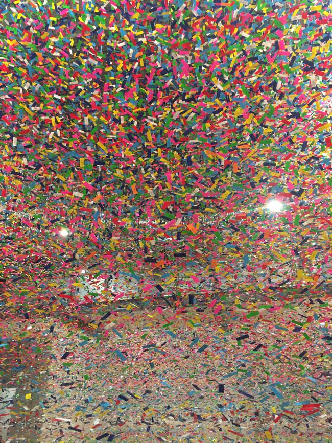 thousands of colorful scraps hanging in the air