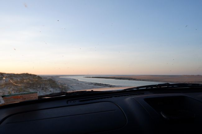 Driving on the beach at sunset