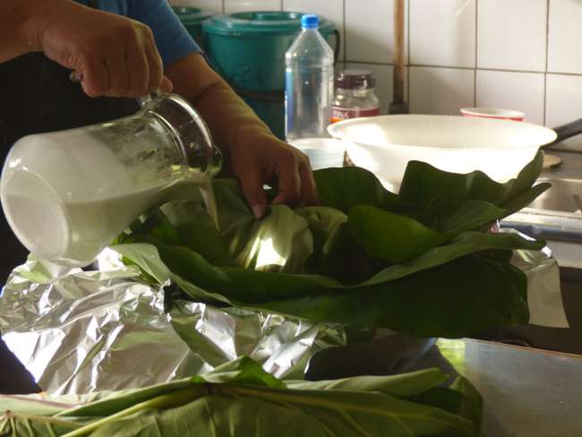 Banana leaves with coconut milk were also cooked
