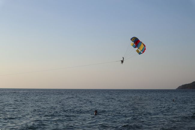 Boat paragliding.