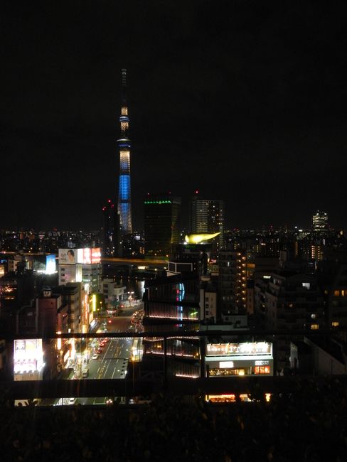Sky Tree and the golden flame of the Asahi Beer Hall by Philippe Starck