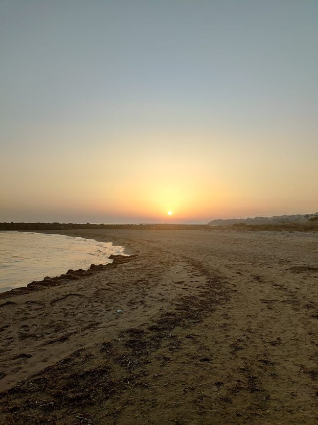 Sunset on the beach in Gela