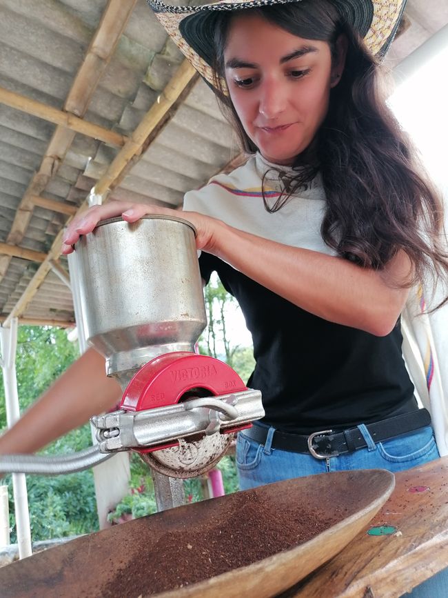 Anna grinding the coffee bean