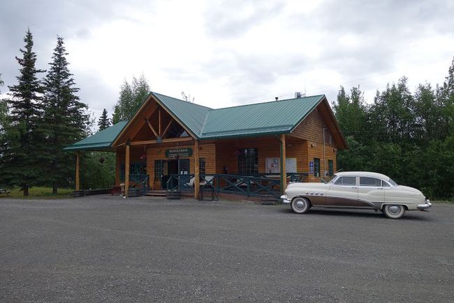 Visitor Center with vintage car