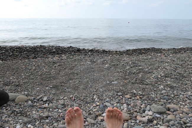 Stone beach on the warm Black Sea