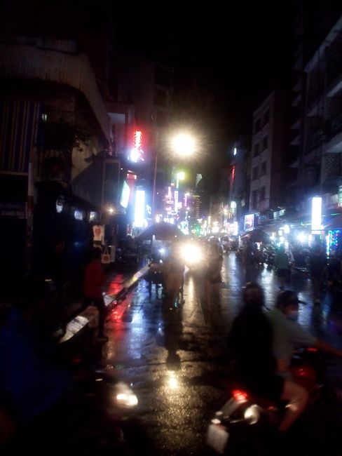 Saigon by night in the rain