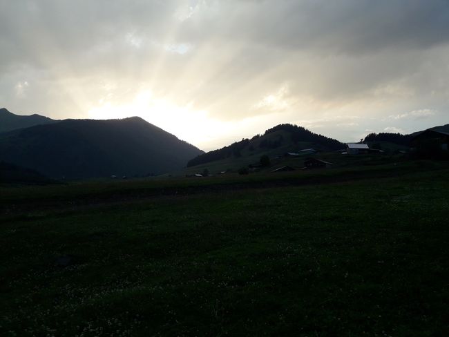 sun behind the mountain