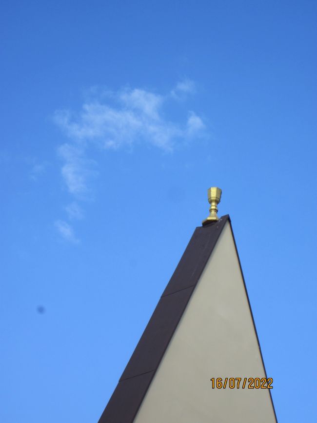 Communion chalice on the spire roof