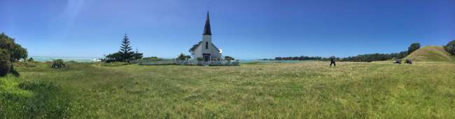 Wooden church on a headland, idyllically situated