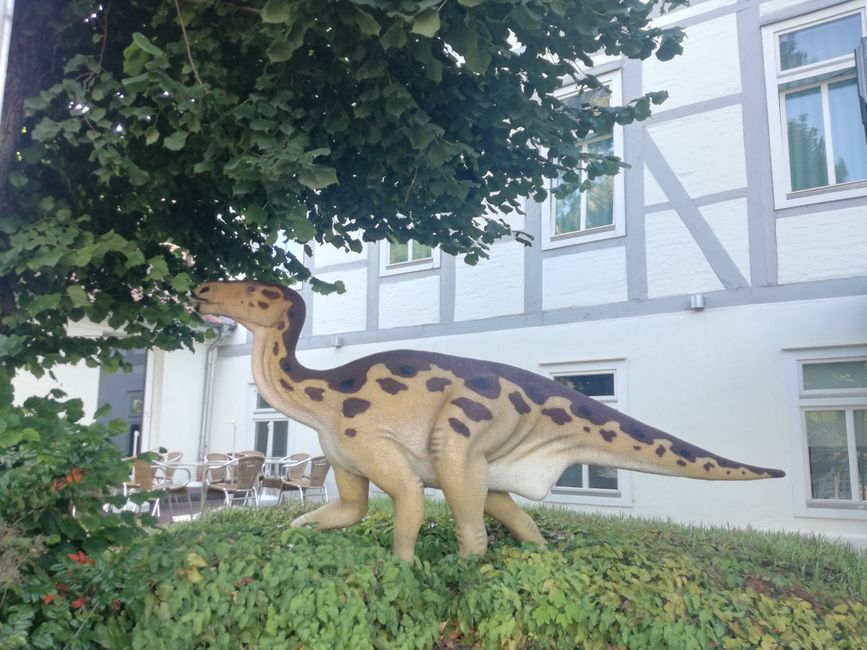 A dinosaur in front of the hotel