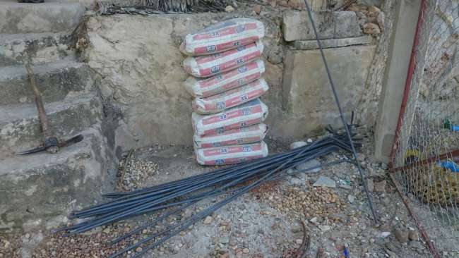 First cement delivery and our first bent iron bars