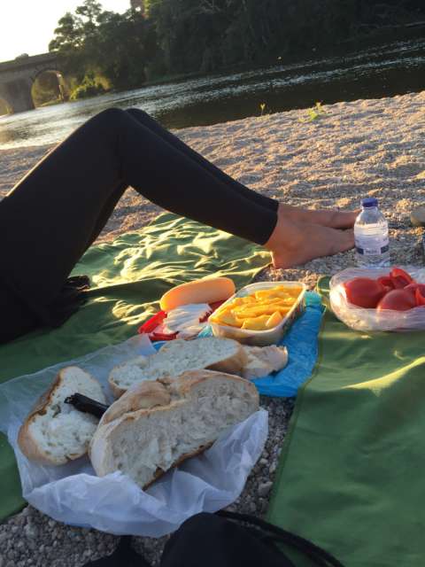 Evening picnic by the river 