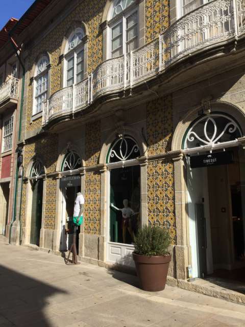typical house facade with beautiful ceramic tiles 