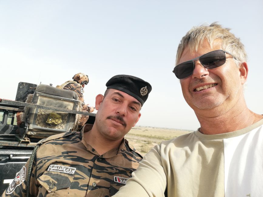 With escort through Iraq