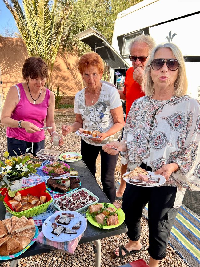 Irmi, Ute, Berndt, and Angelika feast heavily at Wilhelm's birthday buffet. (Photo: Birgit)