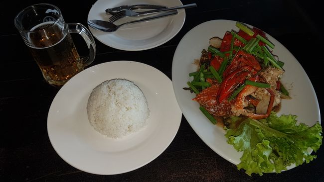 For $10, you could get crab in pepper sauce, rice, and a beer. Highly recommended, even though the food is really laborious.