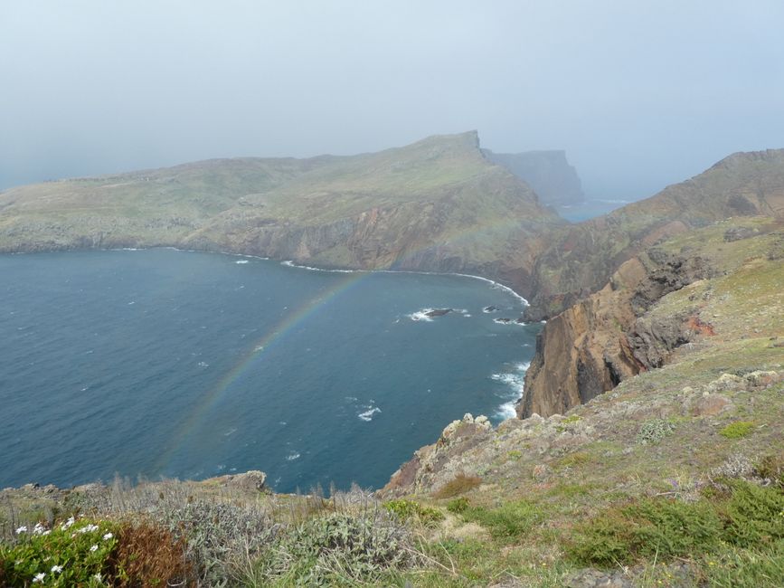 Volcanic rock, storm and rainbow on Sao Lourenco - Madeira's East