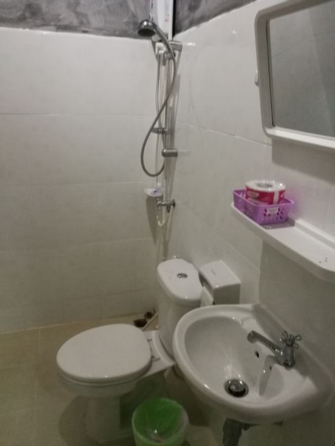Bathroom in Thailand: shower and toilet very close together