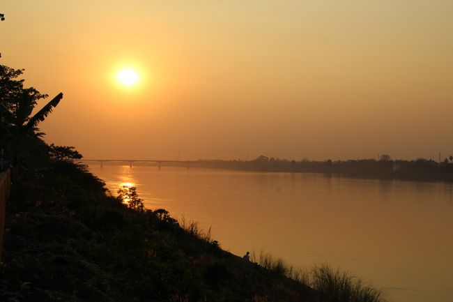 Sunset over the Mekong / Left Thailand, Right Laos