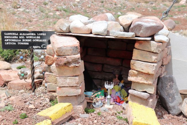 shrine by the roadside with Barbie doll