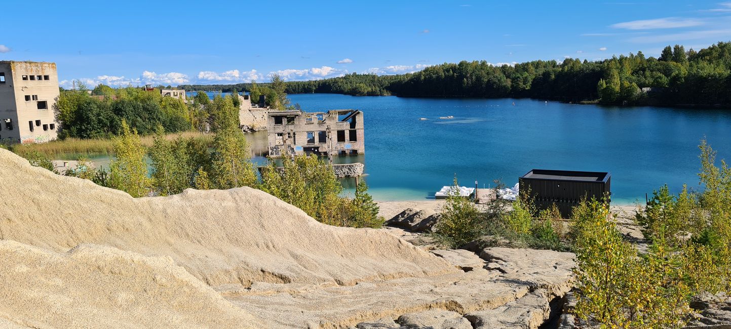 A disused limestone quarry; There is still a lot of old equipment and houses underwater here