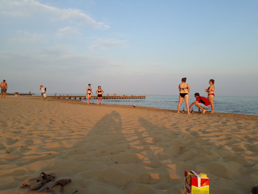 Drinking games on the empty beach.